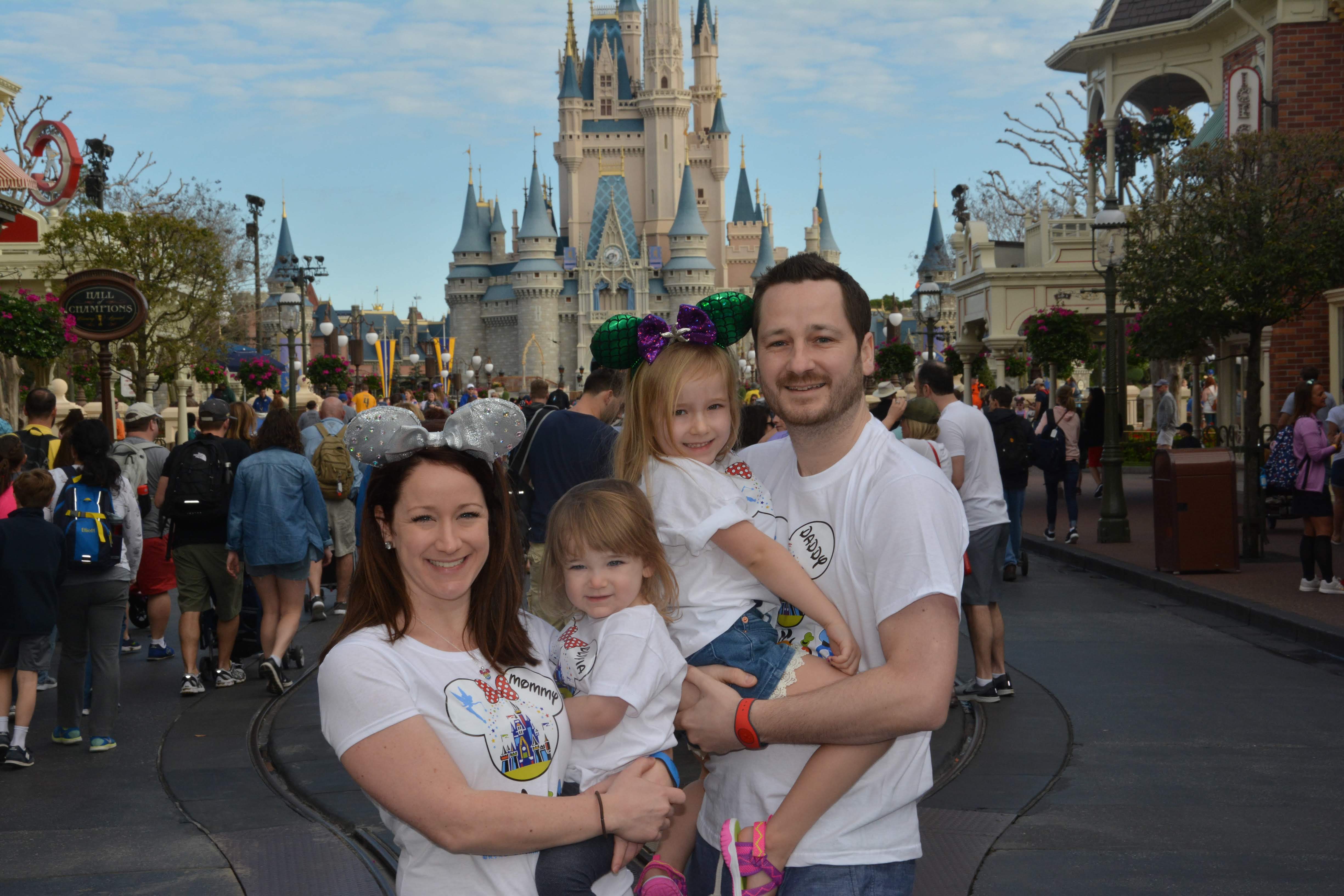 Bixler family at Disney World in 2019 in front of Cinderellas castle
